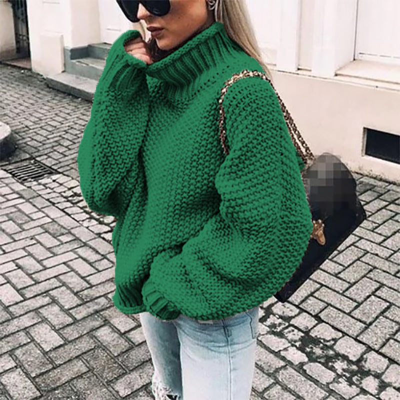Highly flammable knitted sweater for women in a relaxed boxy shape with a roll neck and textured structure Lune London