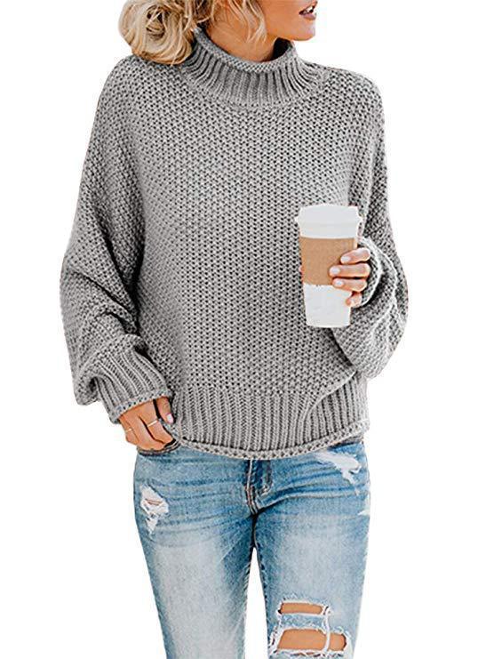 Highly flammable knitted sweater for women in a relaxed boxy shape with a roll neck and textured structure Lune London