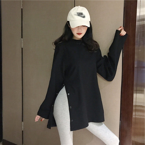 Women's long sleeve shirt with asymmetrical cut and decorative buttons