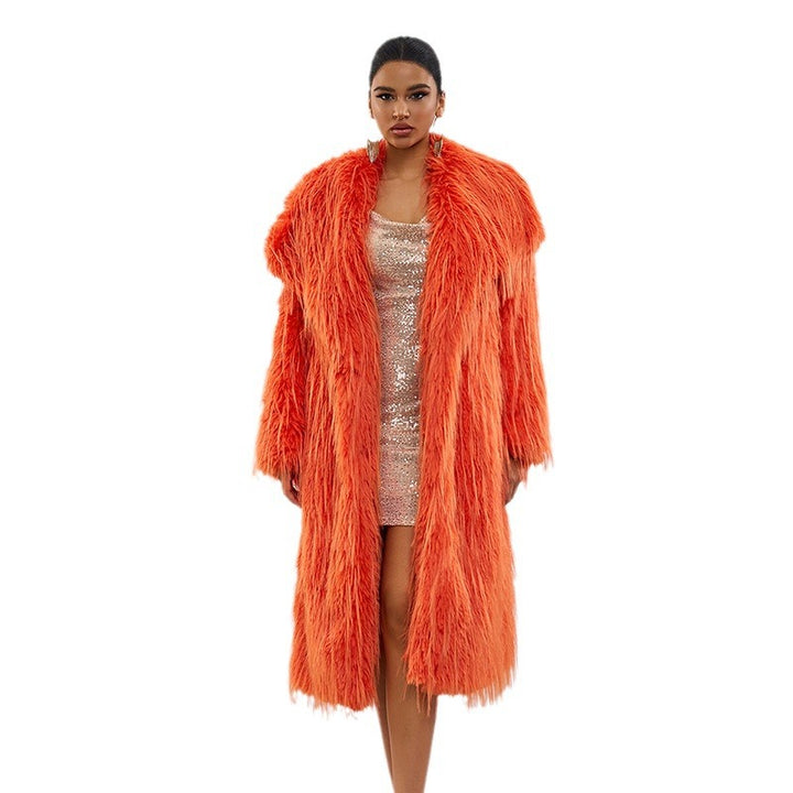 Long women’s faux fur coat with fringes