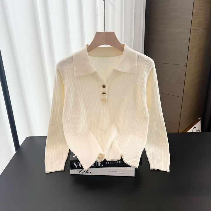 Warmer knitted pullover with contrast colors and zipper