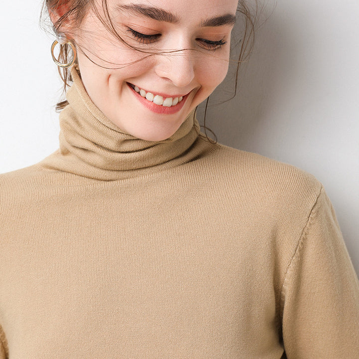 Women's knitted pullover with stand collar and geometric pattern