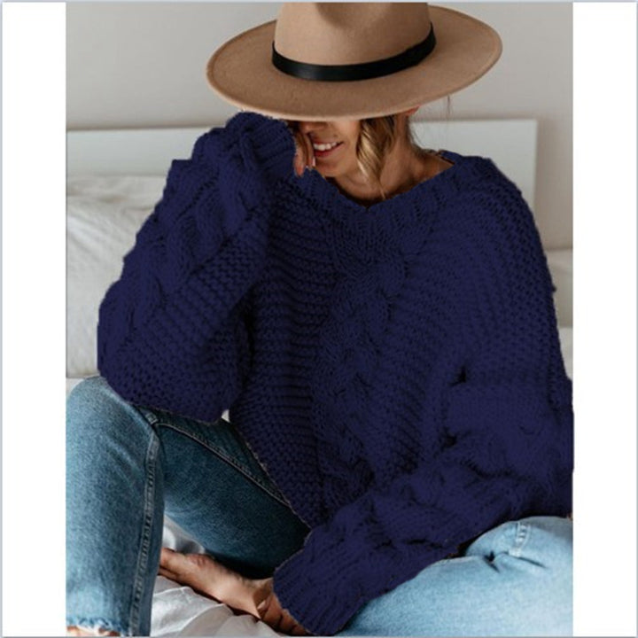 Pull femme en tricot épais avec des manches volumineuses et un design en cable Chic & Stil