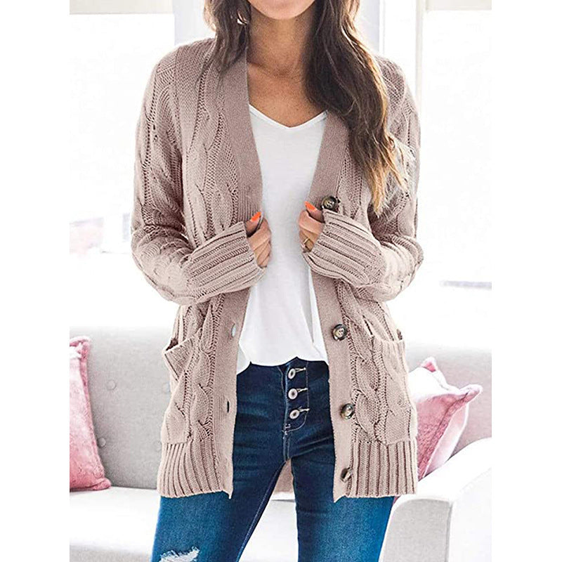 Ladies large knit cardigan with cable pattern and practical pockets Lune London