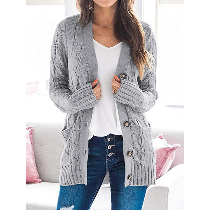 Ladies large knit cardigan with cable pattern and practical pockets Lune London