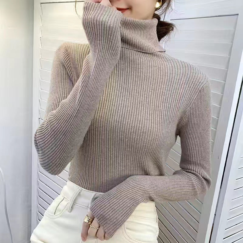 Form-fitting women's turtleneck sweater
