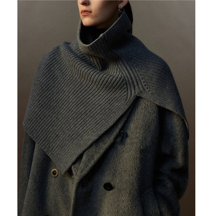 Knitted shoulder warmer made of merino wool with slit