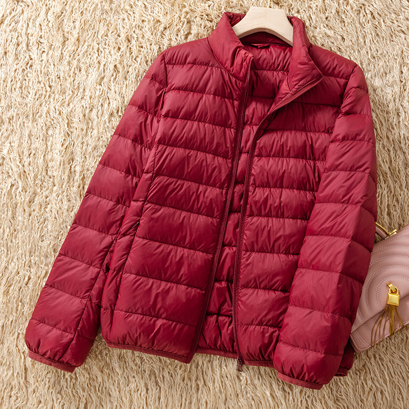 Light women's down jacket with stand-up collar