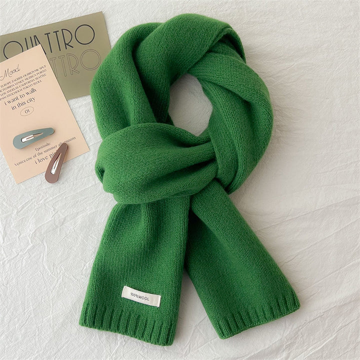 Simple knitted scarf made of pure wool
