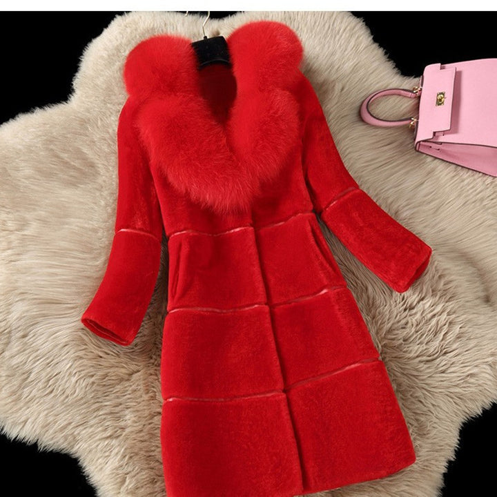 Women's coat made of sheared lambskin with faux fur collar
