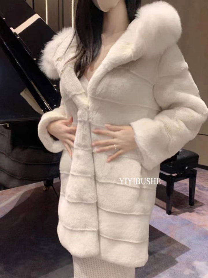 Long women's faux fur coat with hood and fur collar