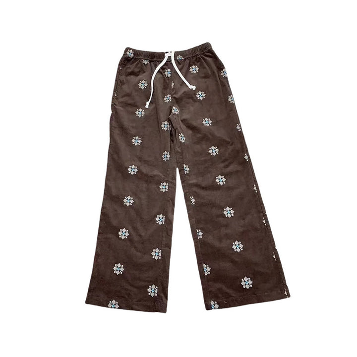 Cord pants with embroidery and flared leg