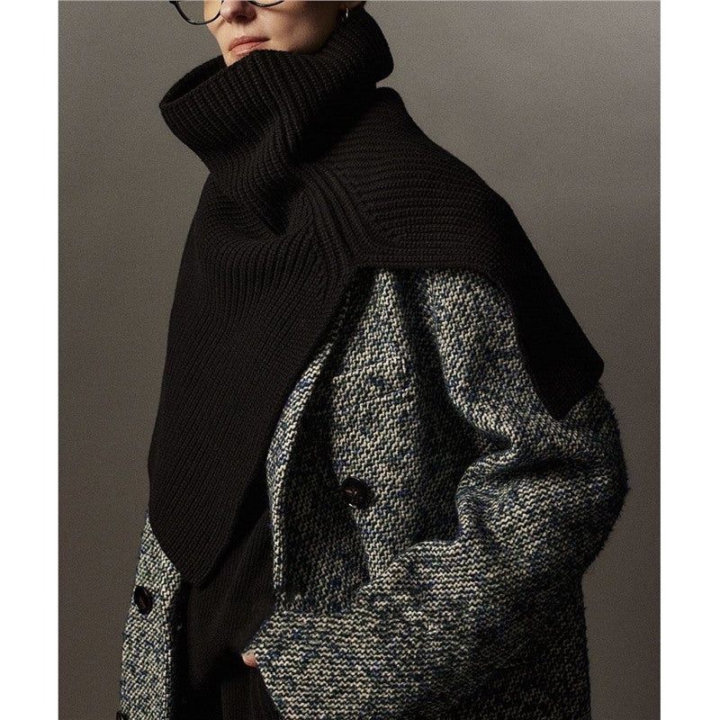Knitted shoulder warmer made of merino wool with slit