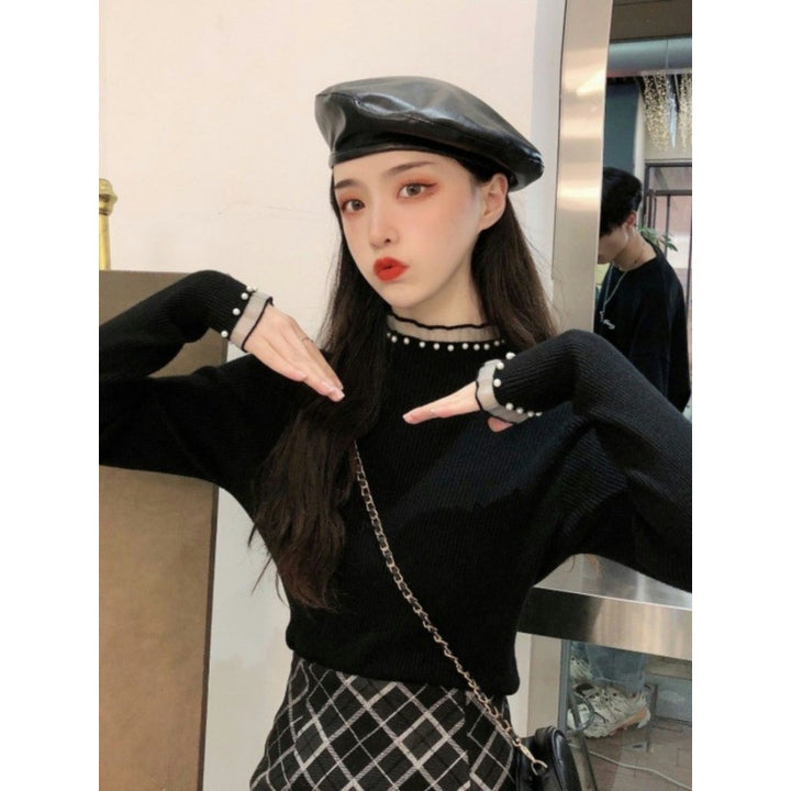 Ladies' knitted sweater with stand-up collar, lace and pearls