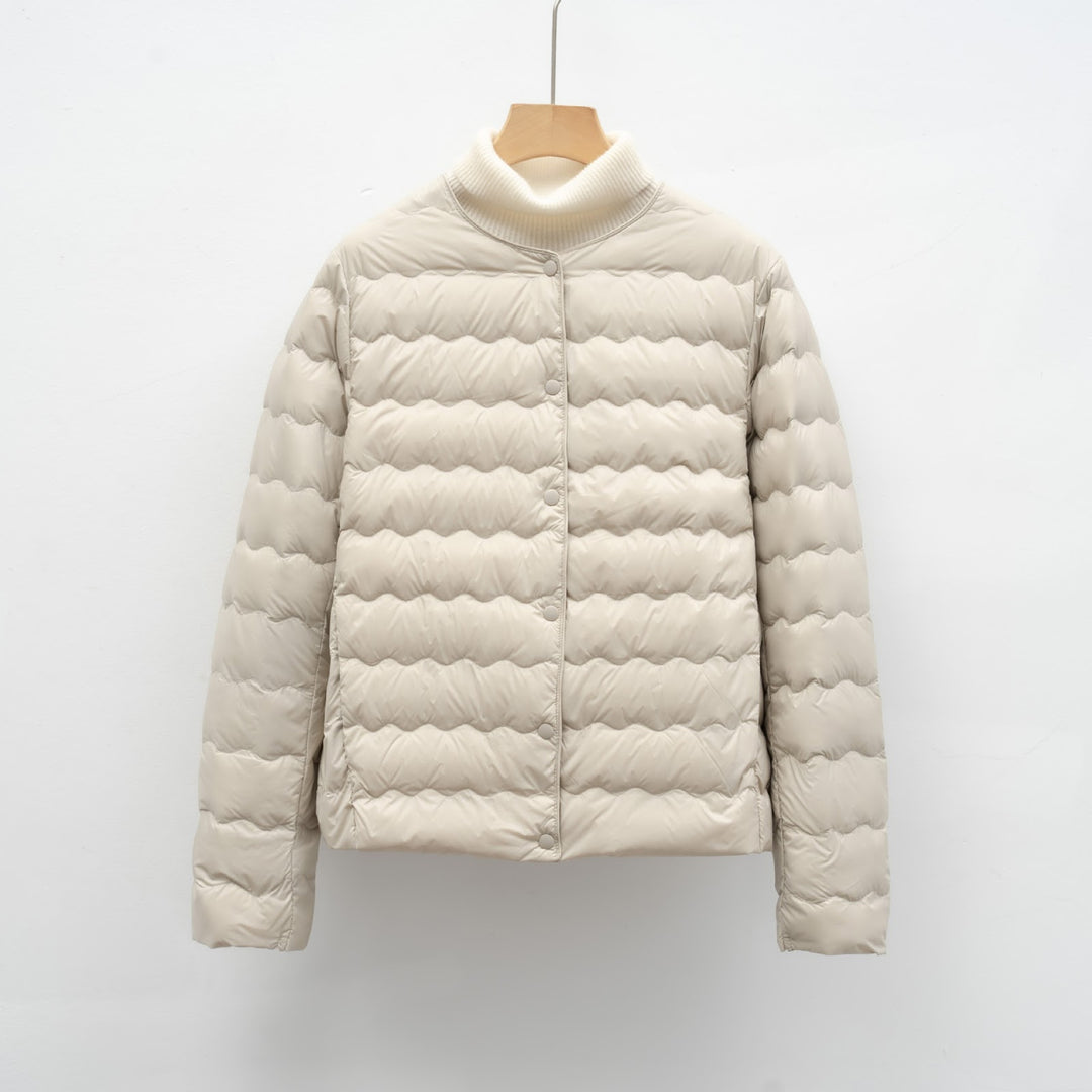 Light women’s down jacket with round neck and wave pattern