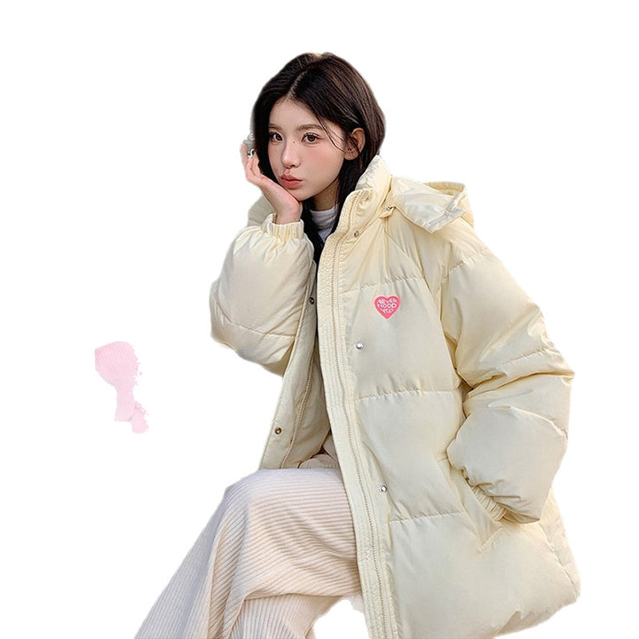 Short, padded women's winter jacket in puffer style