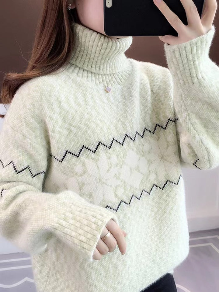 Women's knitted pullover with snowflake pattern and stand-up collar