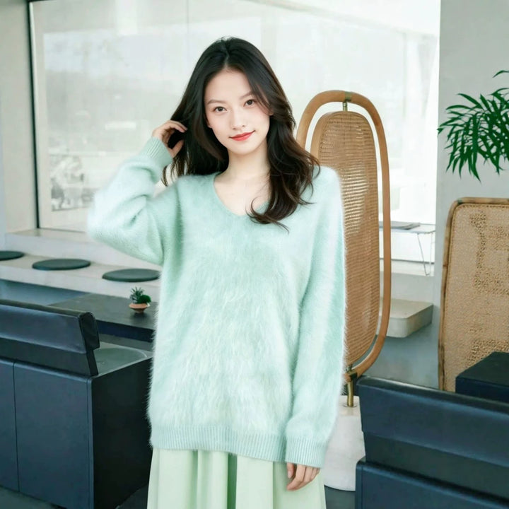 Women's knit sweater made of wool blend with V-neck