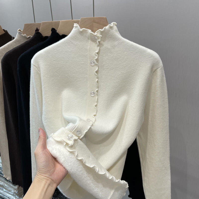 Women's pullover with stand-up collar and wave hem