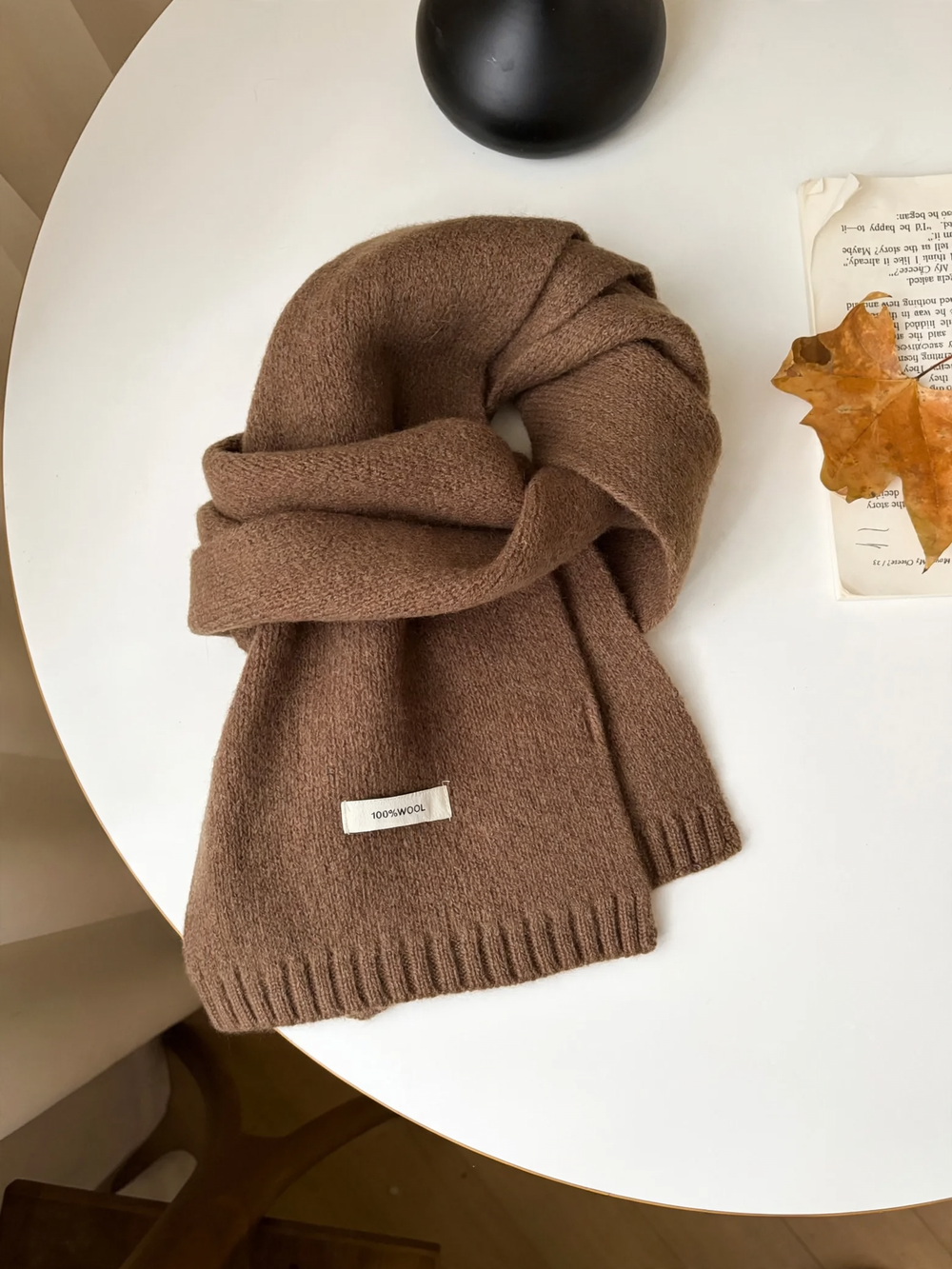 Warm scarf in various shades of brown