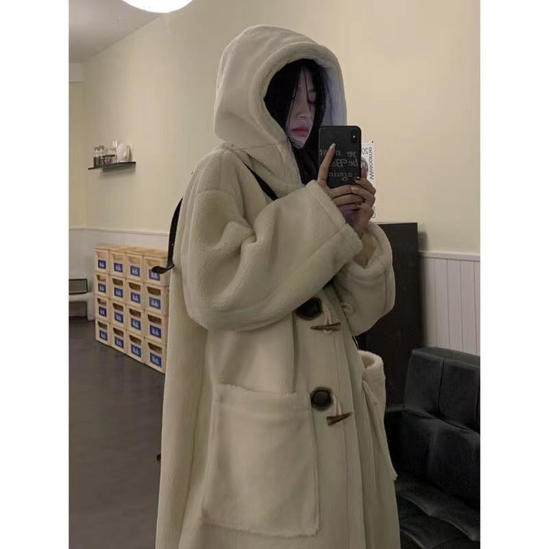Mid-length women's winter coat with toggle buttons