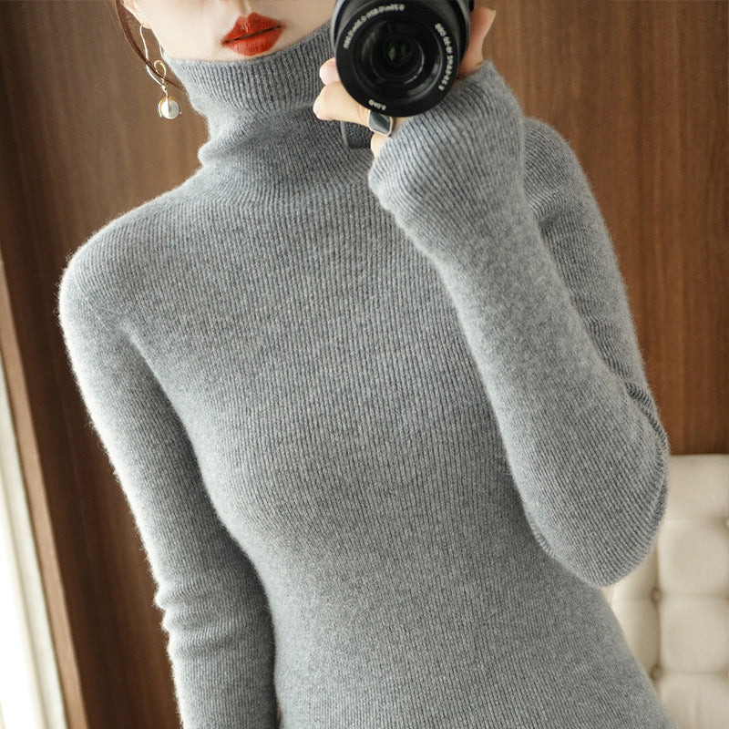 Women's knitted pullover with stand-up collar, fitted