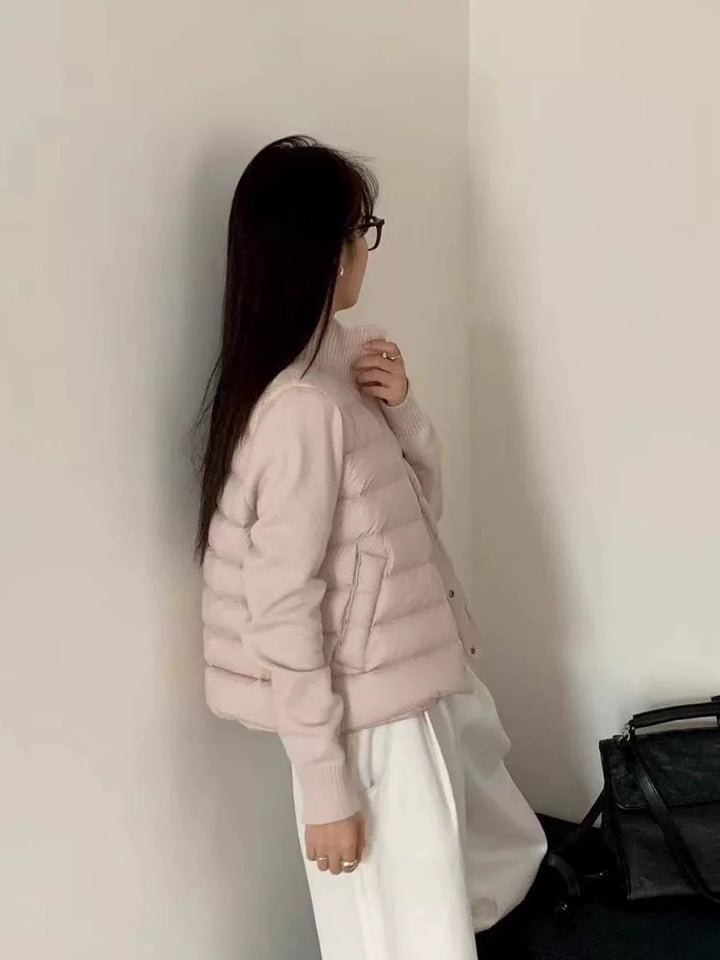 Short women's down jacket with knitted sleeves