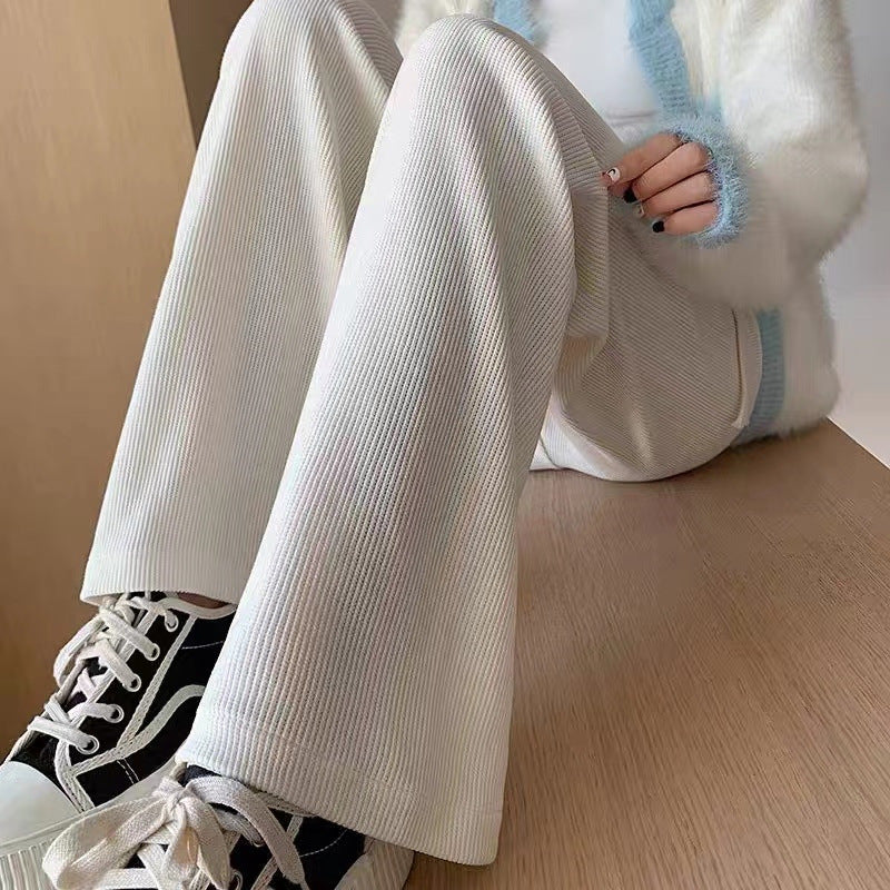 Women’s corduroy pants with a high waistband, straight-cut
