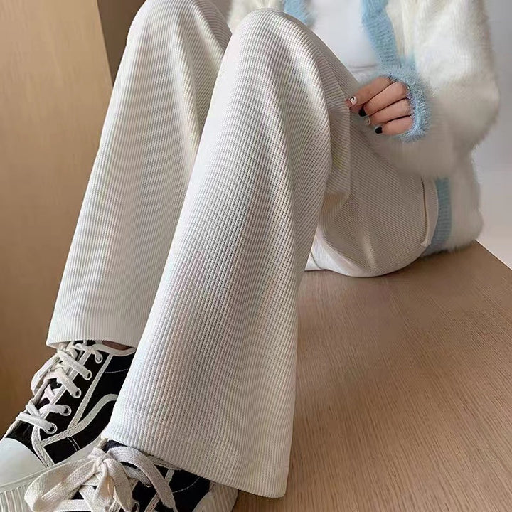 Women’s corduroy pants with a high waistband, straight-cut