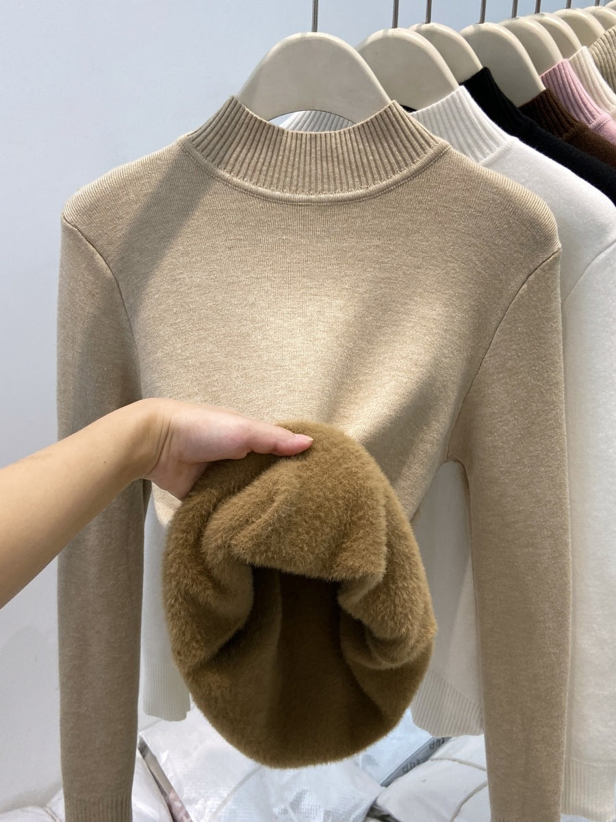Padded women's knit sweater with high collar