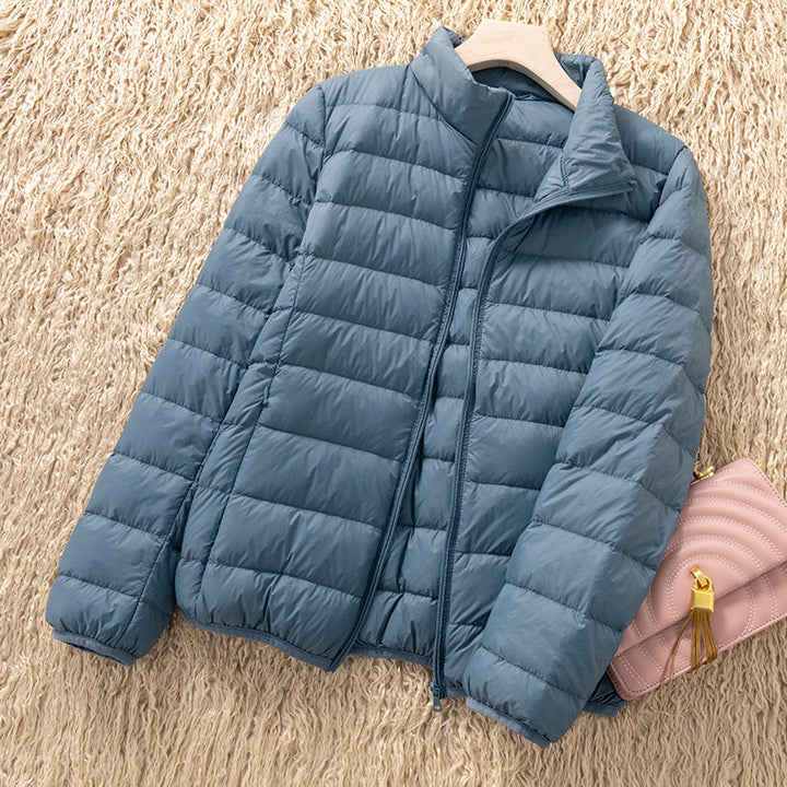 Light women's down jacket with stand-up collar