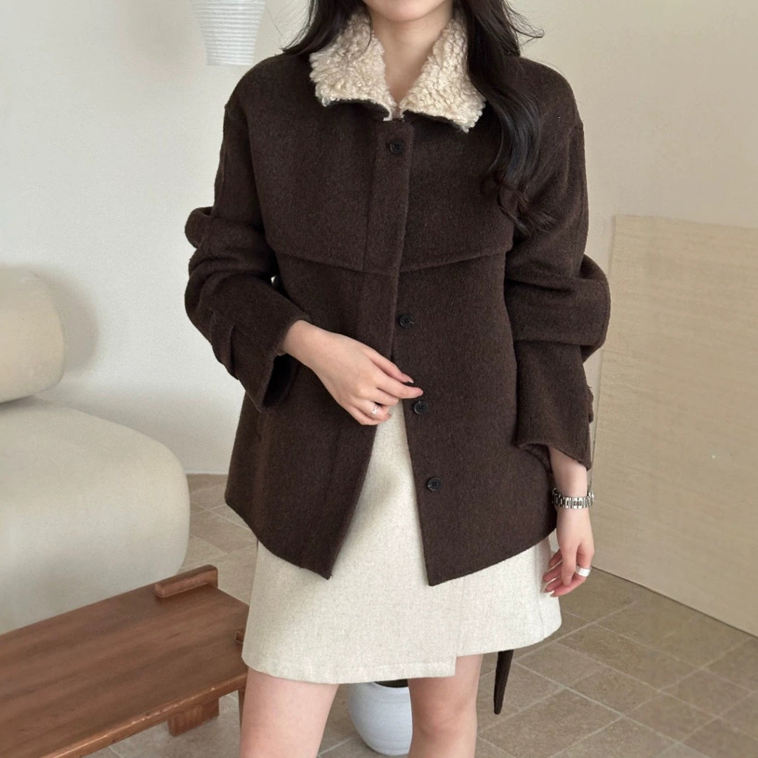Women's coat with faux sheepskin details, lined