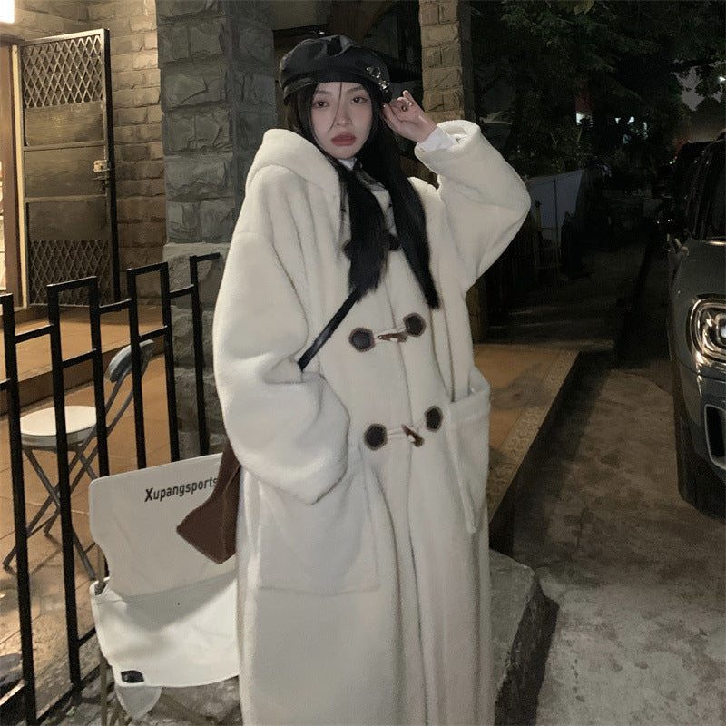 Mid-length women's winter coat with toggle buttons