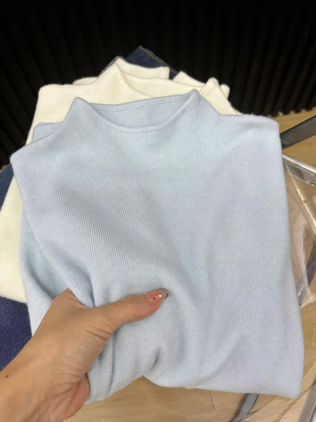 Slim women's knitted sweater with stand-up collar