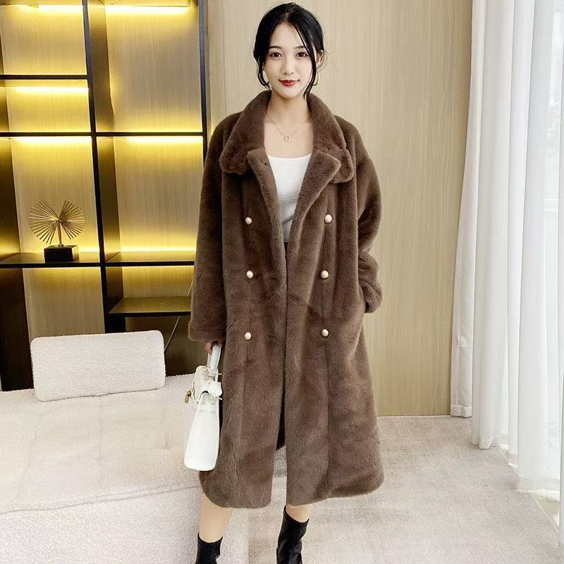 Long women's faux fur coat with stand-up collar
