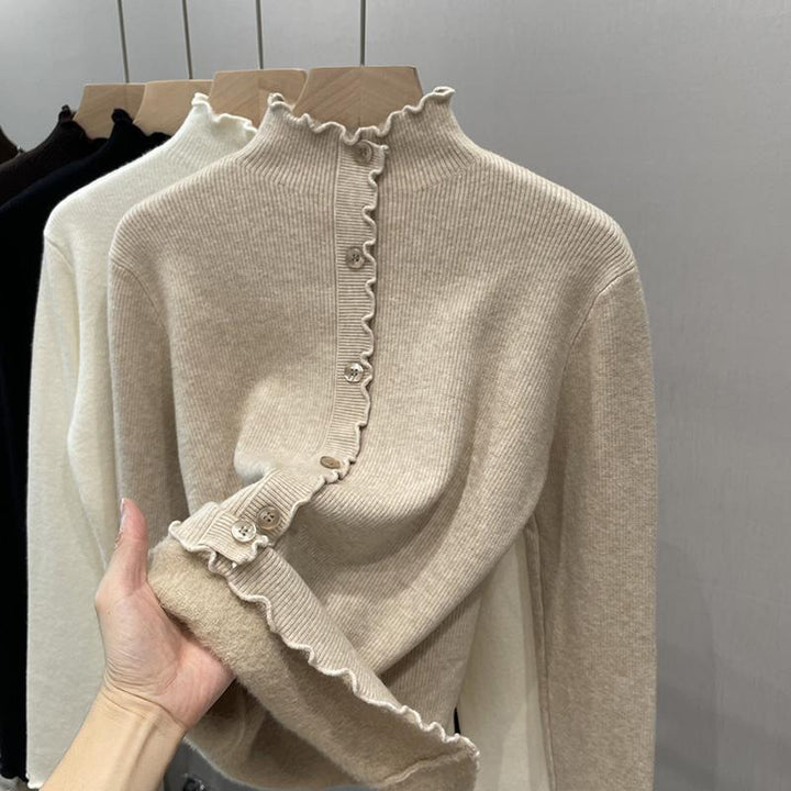 Women's pullover with stand-up collar and wave hem
