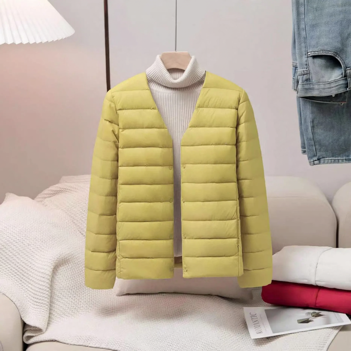 Light women's down jacket, short, as a base layer jacket
