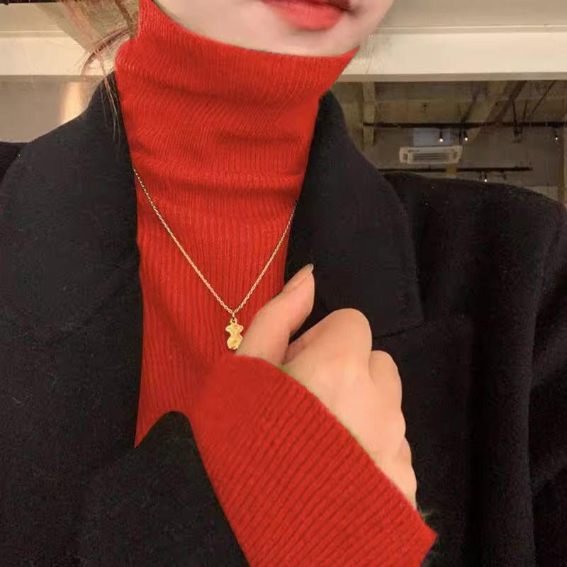 Women's knitted sweater, roll neck, body-hugging