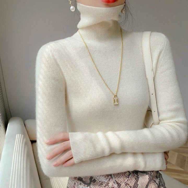Elegant women's turtleneck sweater, slim fit