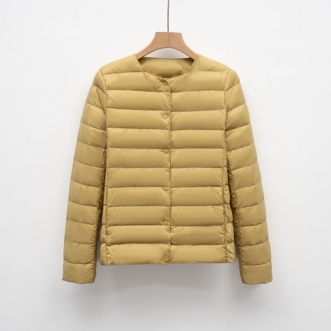 Light women's quilted jacket with round neckline