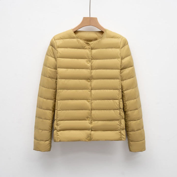 Light women's quilted jacket with round neckline