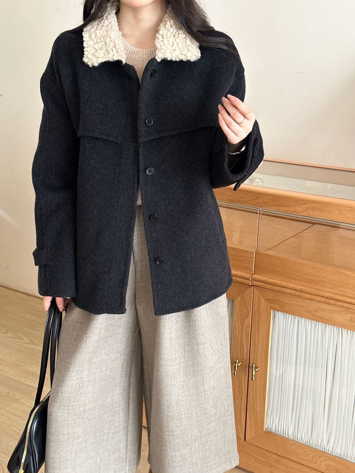 Women's coat with faux sheepskin details, lined