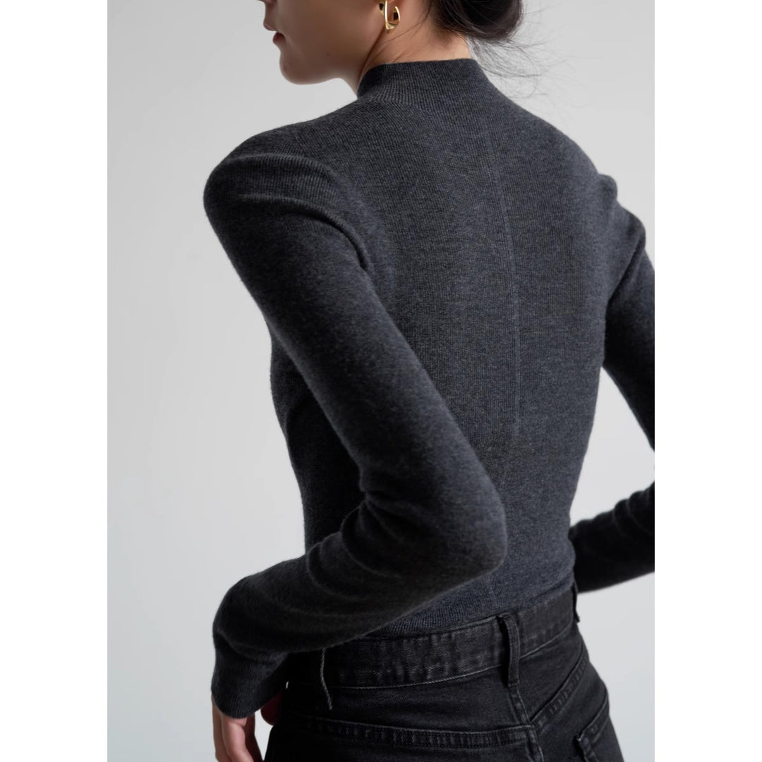 Elegant women's knit sweater with stand-up collar