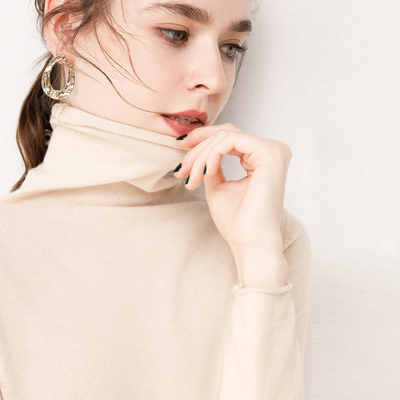 Short roll-neck knit sweater made of wool blend