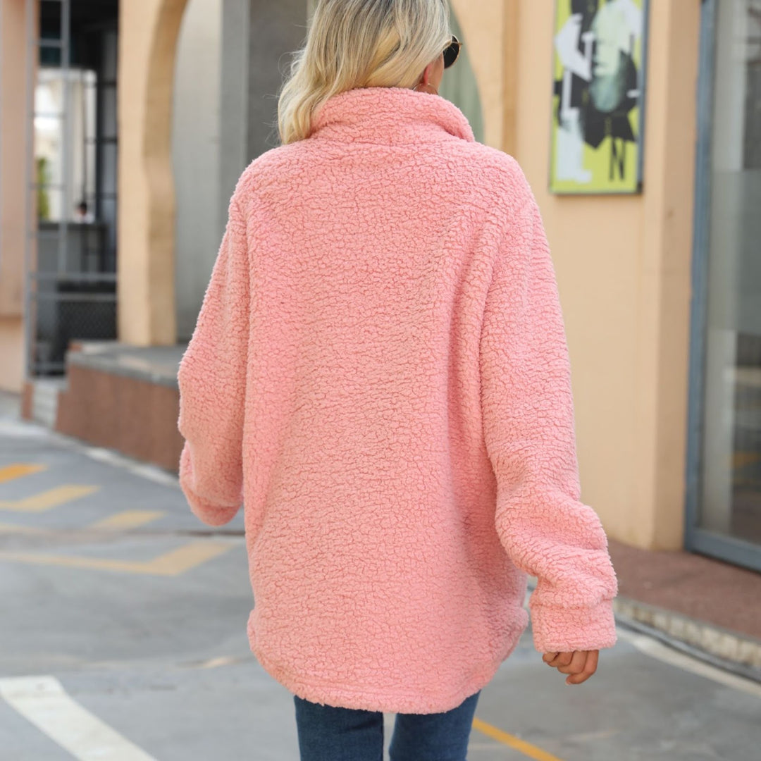 Long women's coat made of soft plush with notched collar