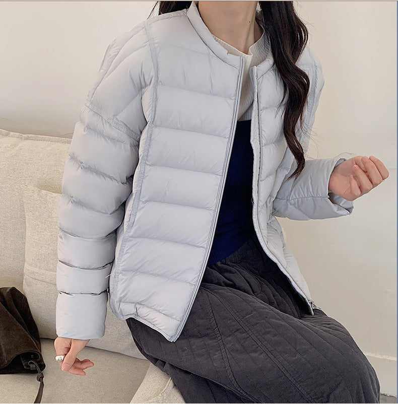 Short women's down jacket, lightweight, loose fit