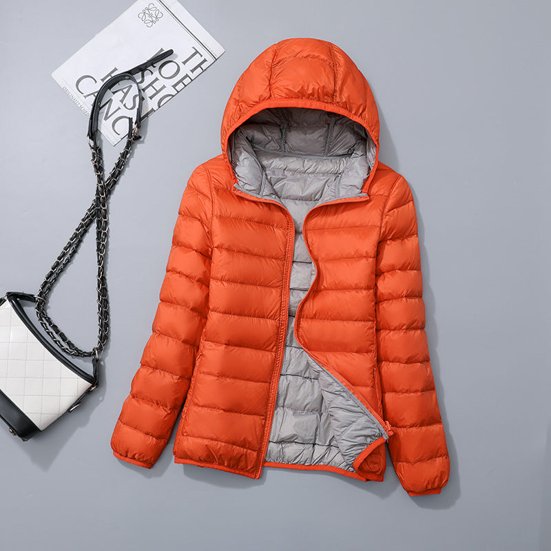 Reversible ladies' down jacket, lightweight and generously cut