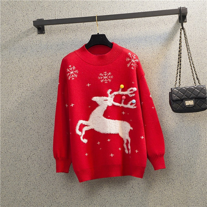 Loose women's Christmas sweater with reindeer motif