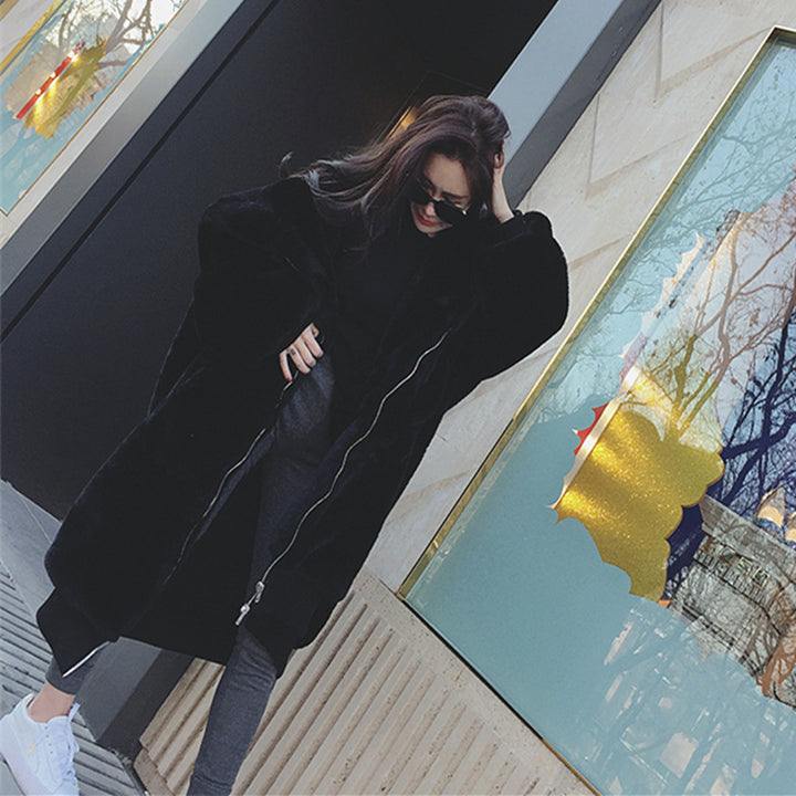 Long ladies' hooded jacket in rabbit fur look