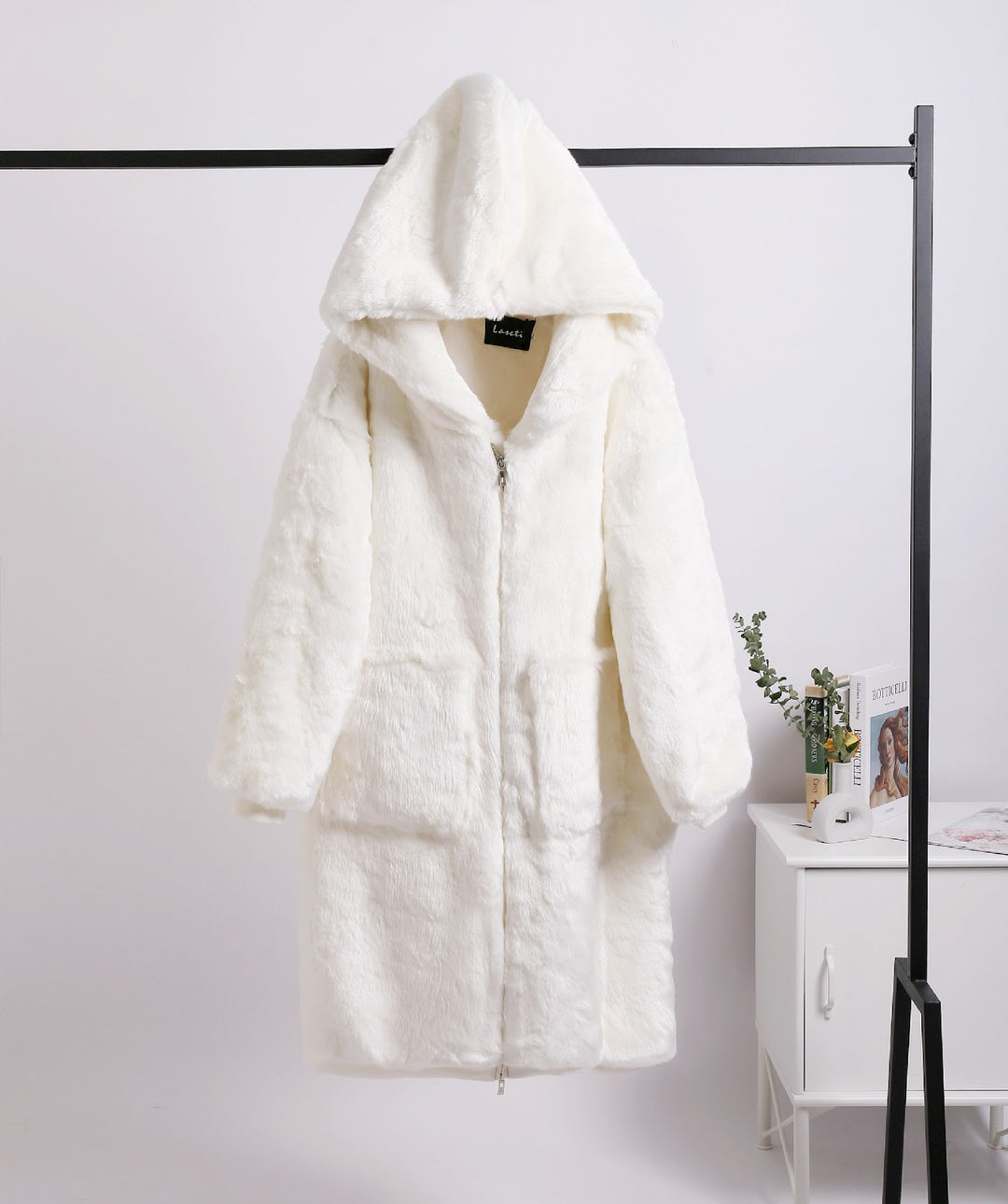 Long ladies' hooded jacket in rabbit fur look